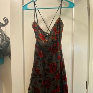 Black “backless” dress with flowers